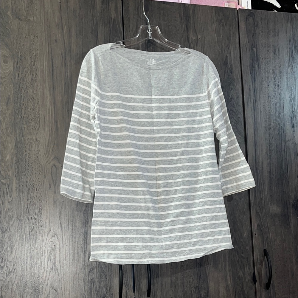 Gray and white shirt size small